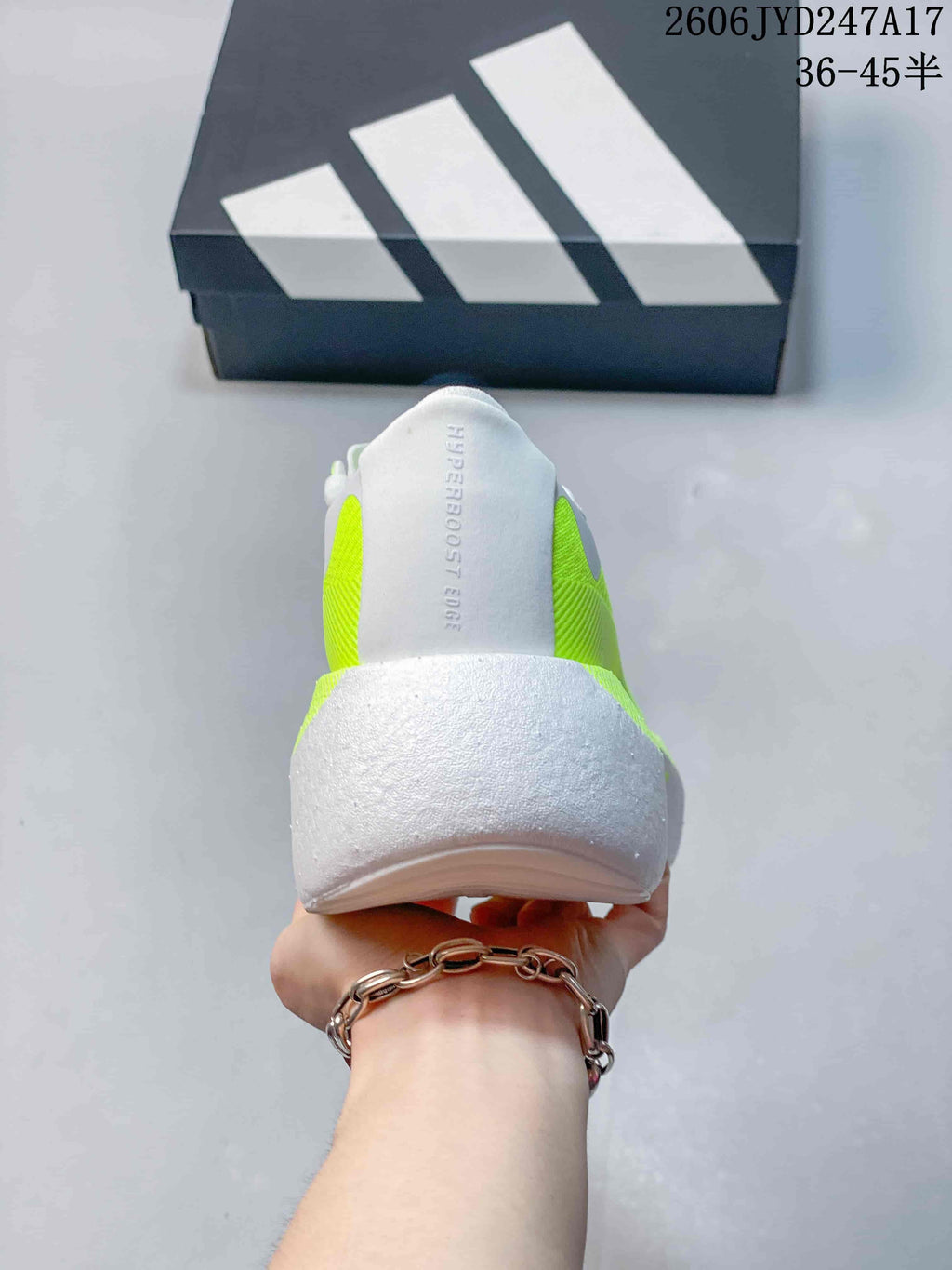 Rear view of the sneaker showing the heel and Hyperboost Edge tongue branding