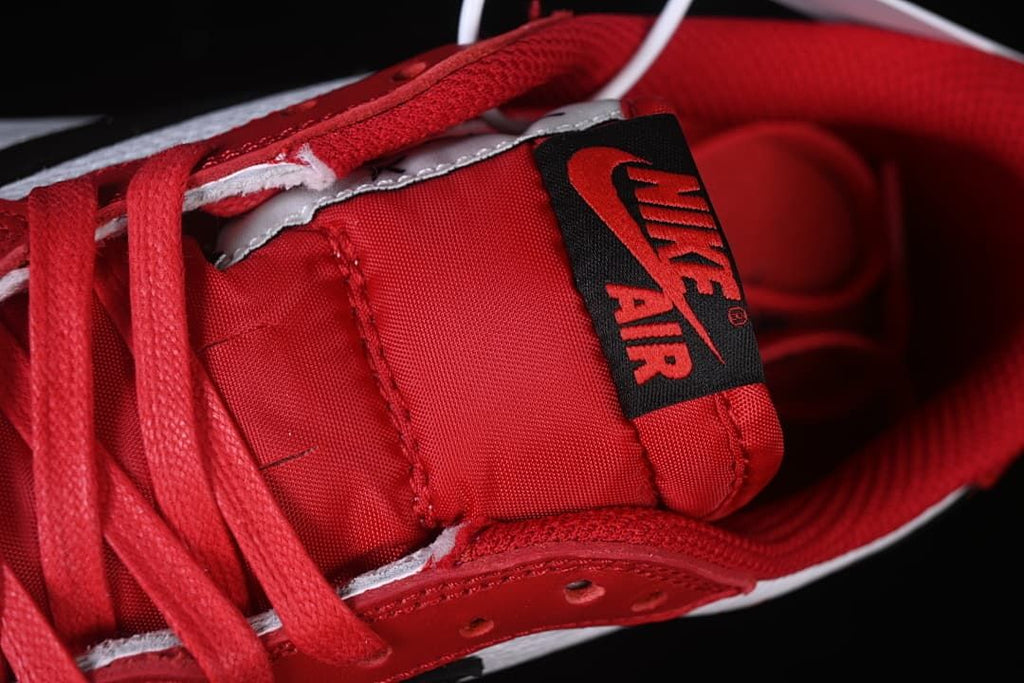 Close-up of the red tongue and black Nike Air label.