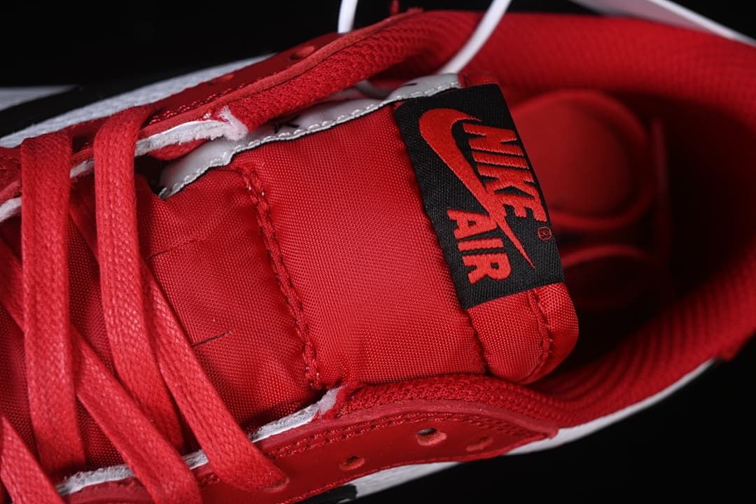 Close-up of the red tongue and black Nike Air label.