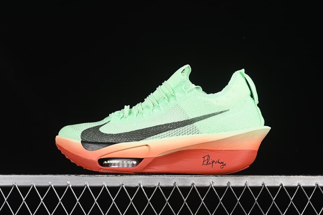 Side view of mint-green Nike Alphafly 3 EK shoes with black Swoosh and coral-toned sole