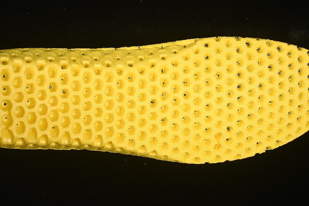 Close-up of the shoe's yellow textured insole