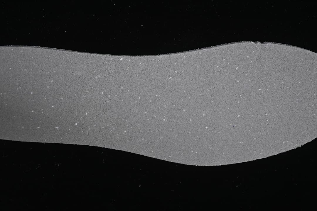 Close-up view of a gray footwear component.
