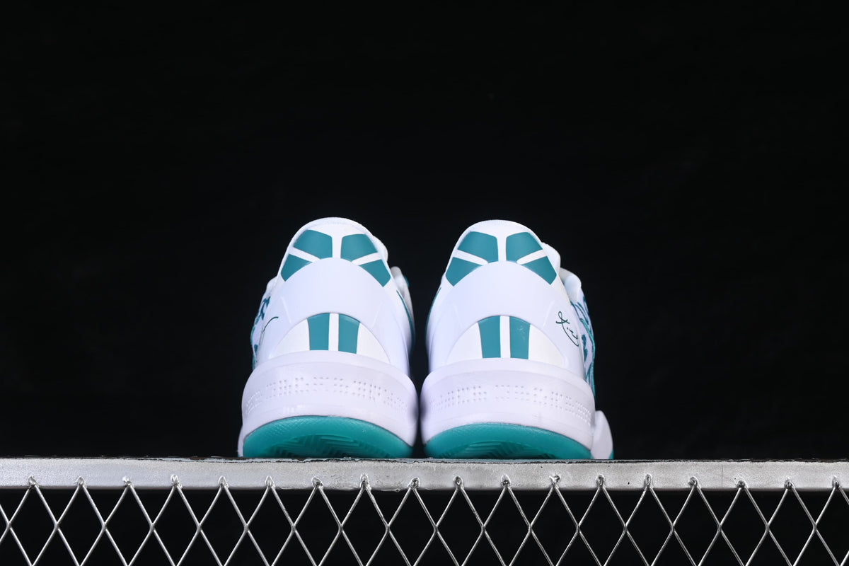 Rear view of the pair showing heel details and teal outsole edges