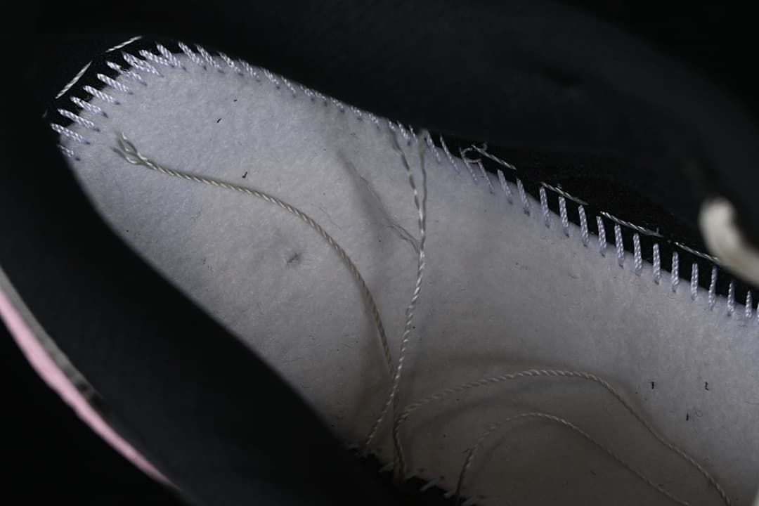 Close-up of the shoe’s interior stitching and lining