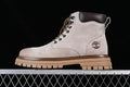 Side view of a beige-grey Timberland TB10078 mid-height lace-up boot