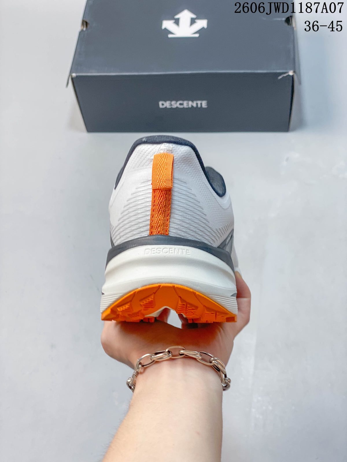 Rear view of the shoe with an orange heel pull tab