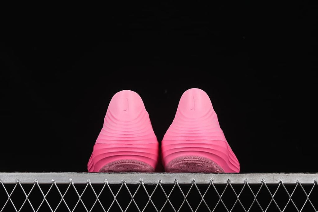 Rear view of the pair showing molded heel logos and sculpted ridges.
