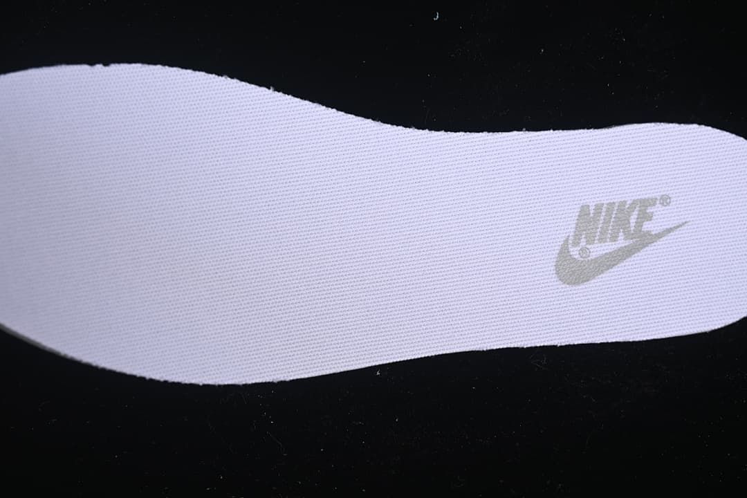 Close-up of the sneaker insole with Nike branding