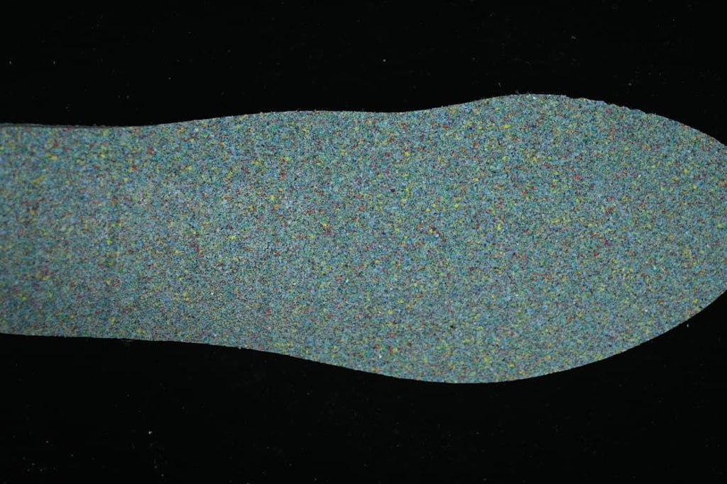 Textured multicolor shoe insole shown from above