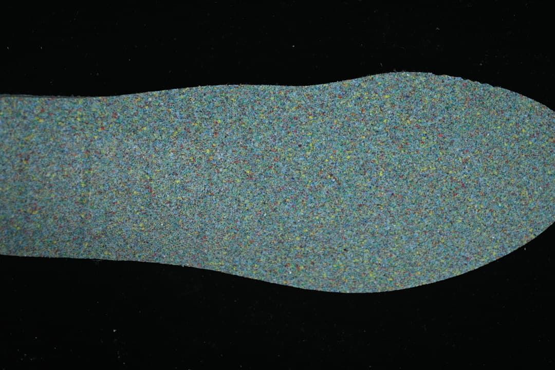 Textured multicolor shoe insole shown from above