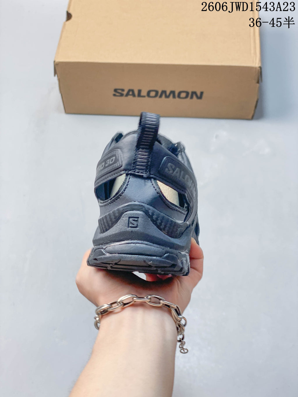 Rear view of a dark gray Salomon XA Pro 3D Amphib shoe.
