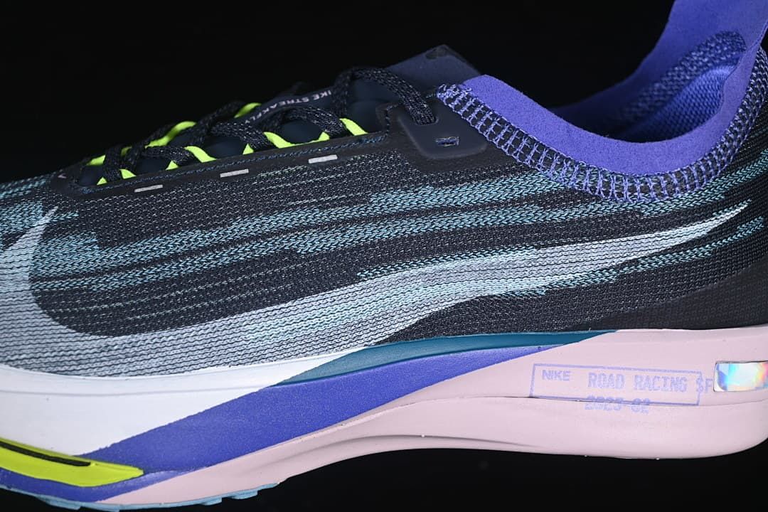 Close-up side view of the patterned upper, laces and sculpted sole.
