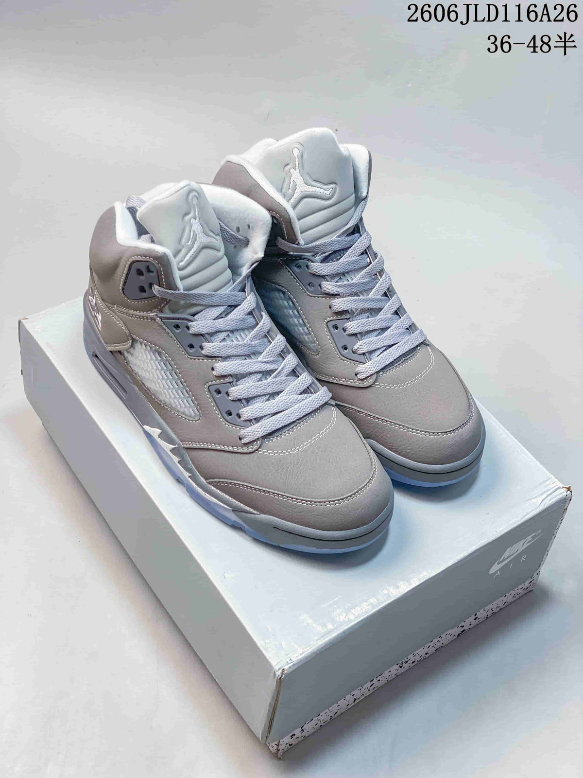 Pair of gray high-top sneakers with pale accents