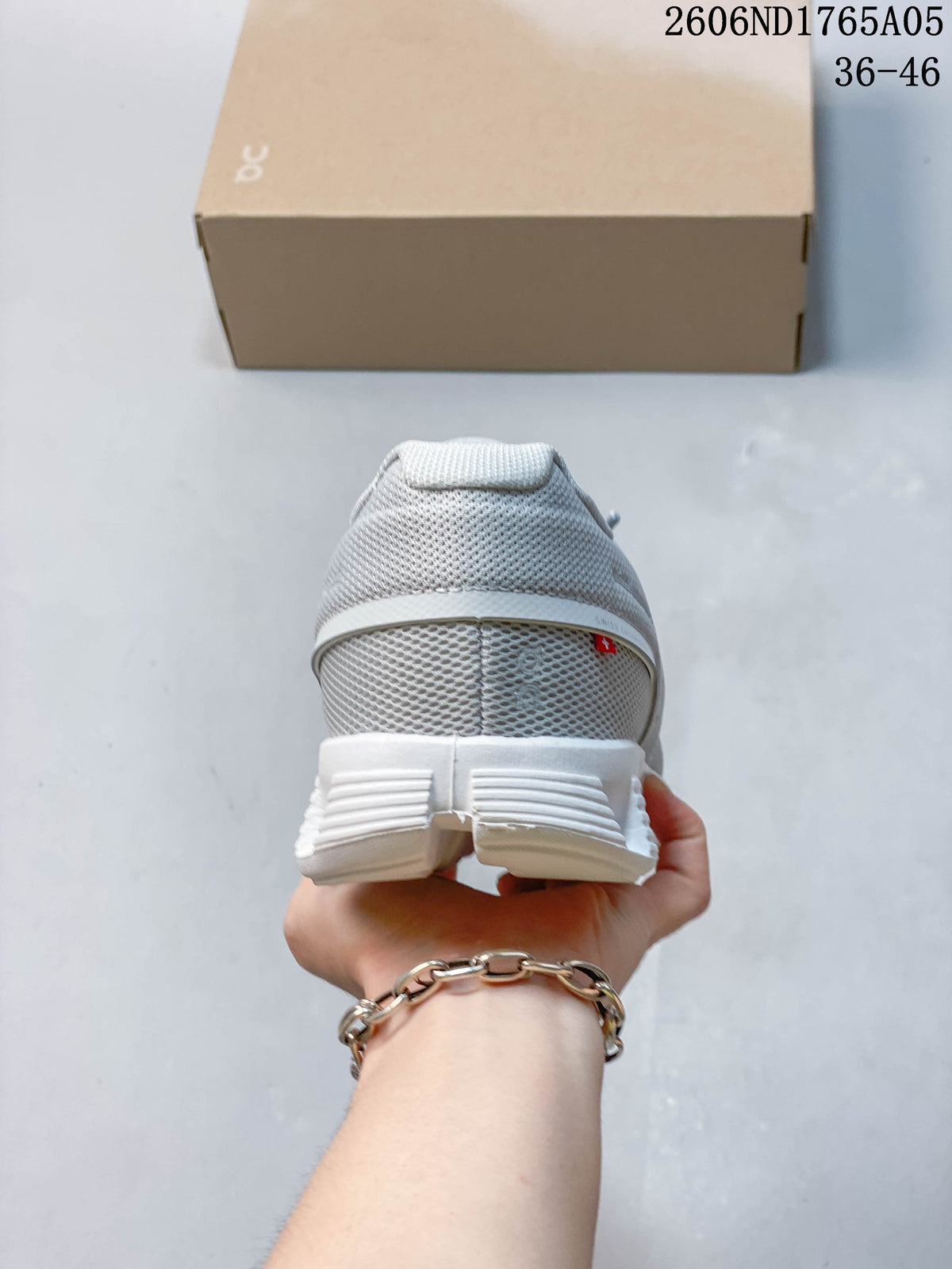 Rear view of a light grey On Cloud 5 sneaker