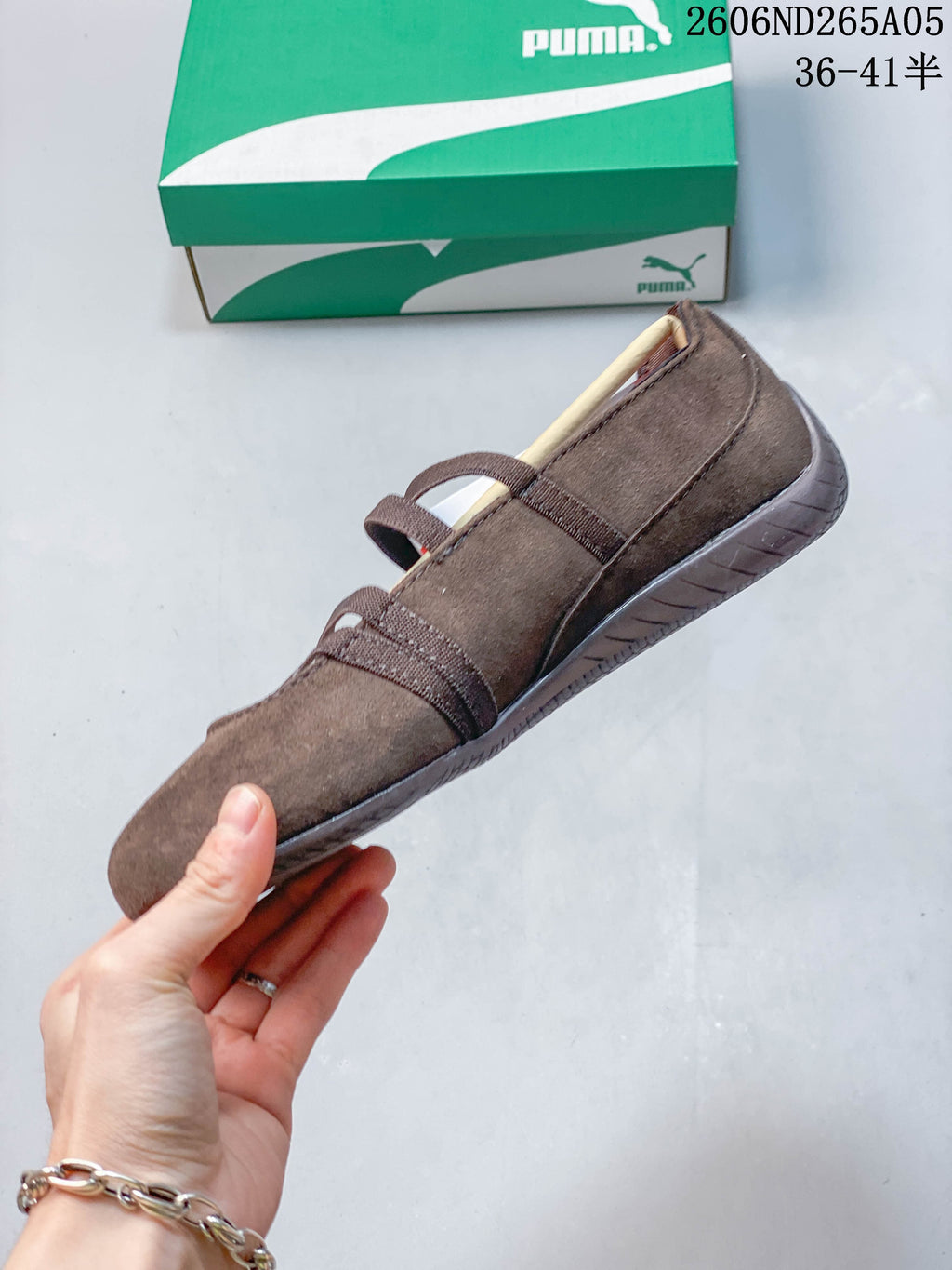 Side profile of a brown PUMA Speedcat Ballet shoe with a low-profile sole