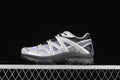 Side view of Salomon XT-Quest sneakers in silver, black, and pale lavender