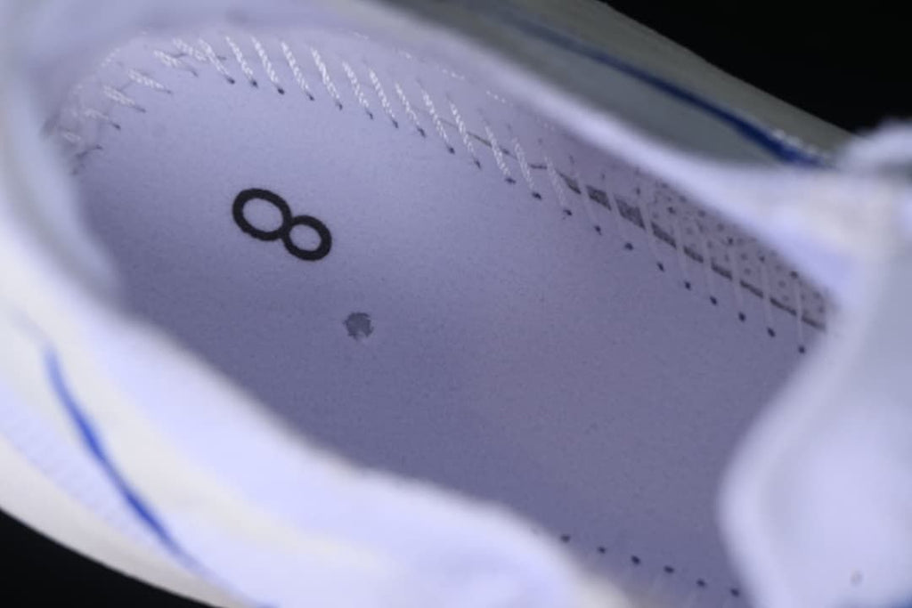 Close-up inside the shoe showing the number 8 on the insole.