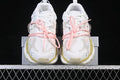 Front view of white and light-gray GG-CC chunky sneakers with pink laces and pale yellow accents.