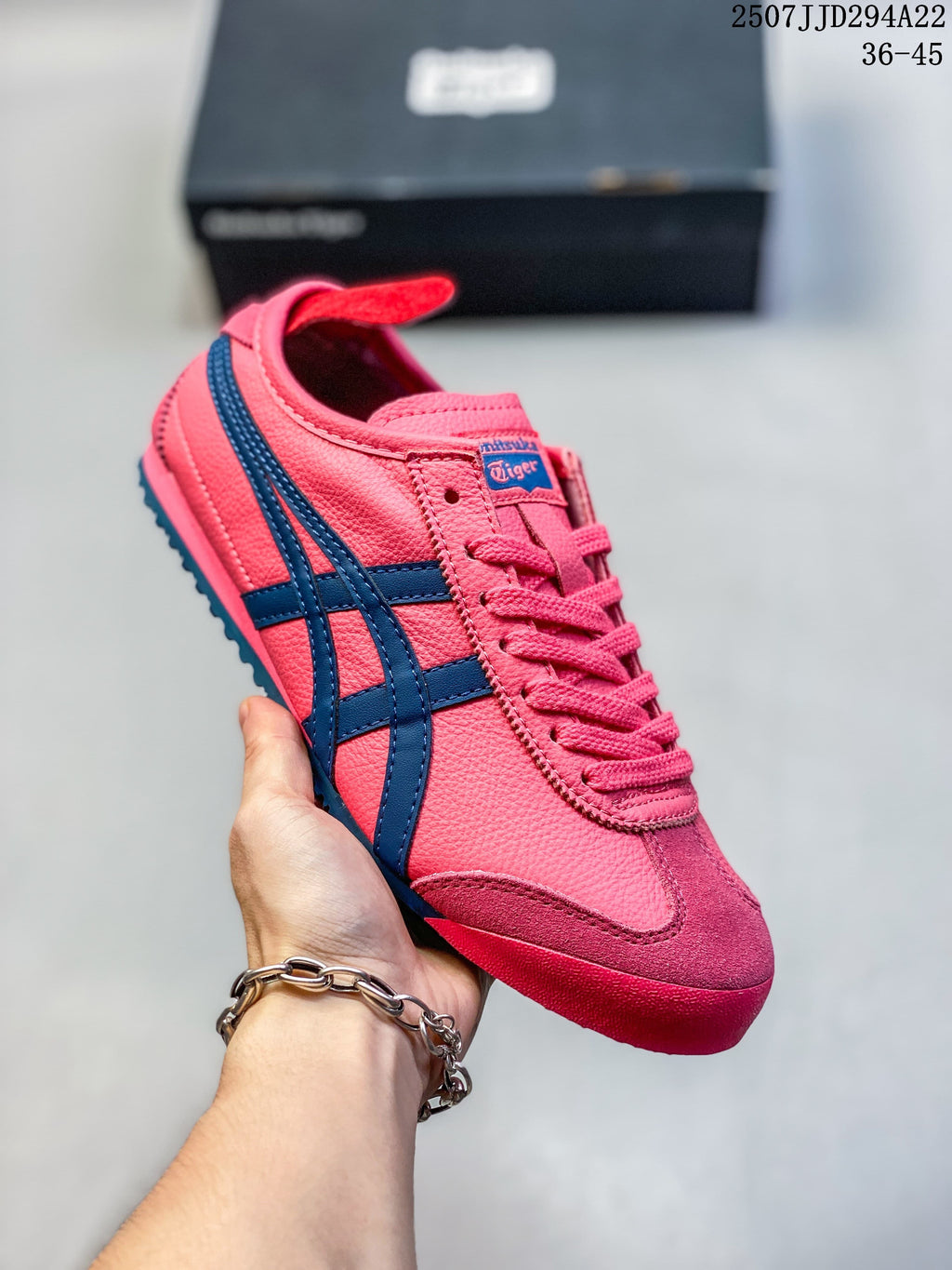 Bright pink Mexico 66 Deluxe sneaker with navy side stripes