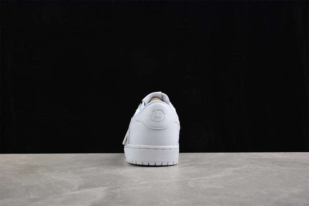 Rear view of the white sneaker and its heel