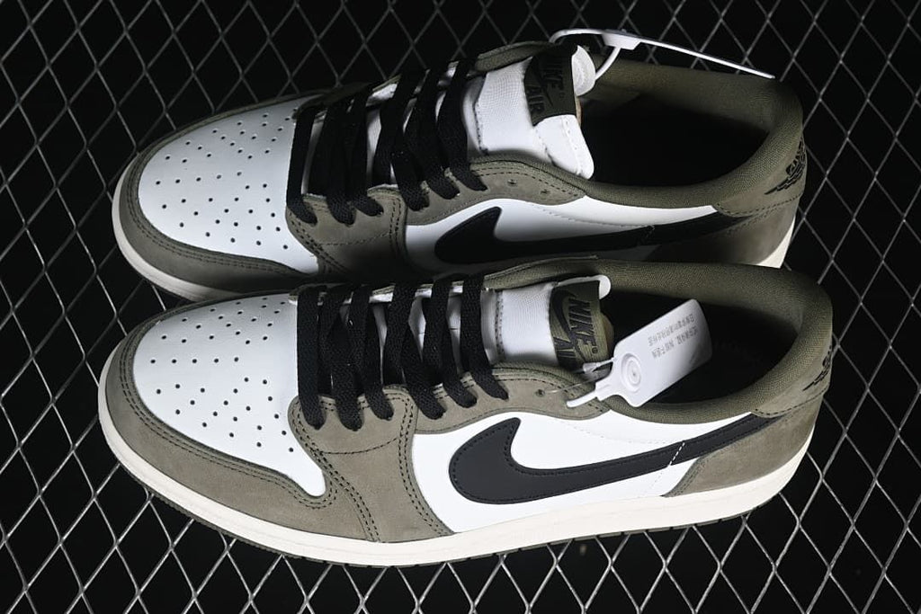 Overhead view of the pair of olive, white, and black low-top sneakers