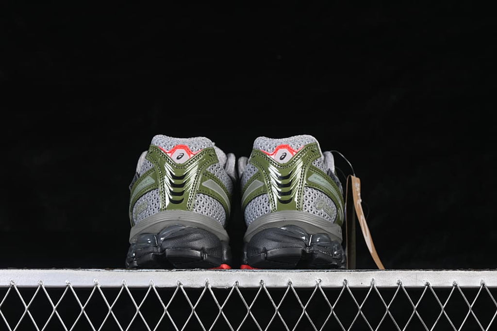 Rear view of both shoes with contrasting heel details.