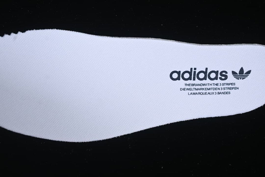 Close-up of the white insole with adidas branding