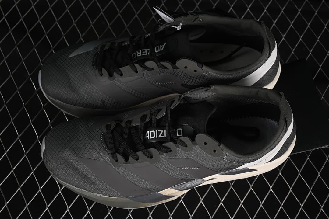 Pair of dark gray Adios 9 shoes viewed from above