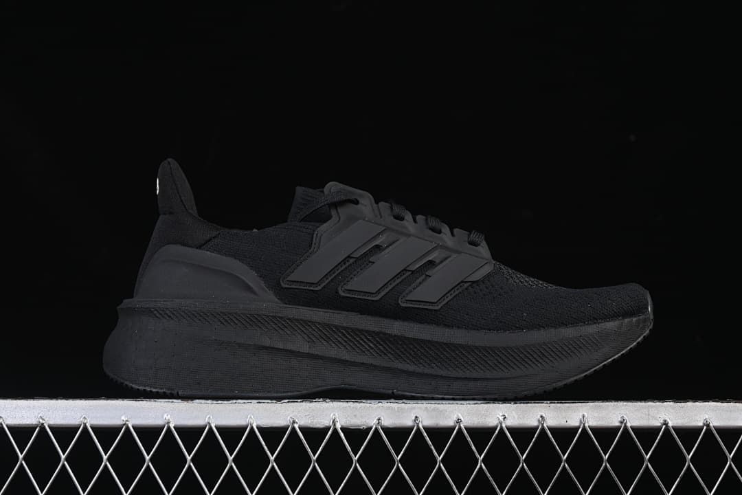 Side profile of the black shoe.