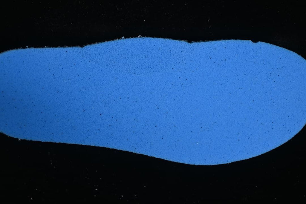 Blue textured shoe insole shown separately