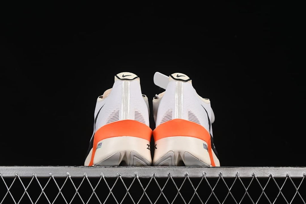 Rear view of the pair showing orange heel accents