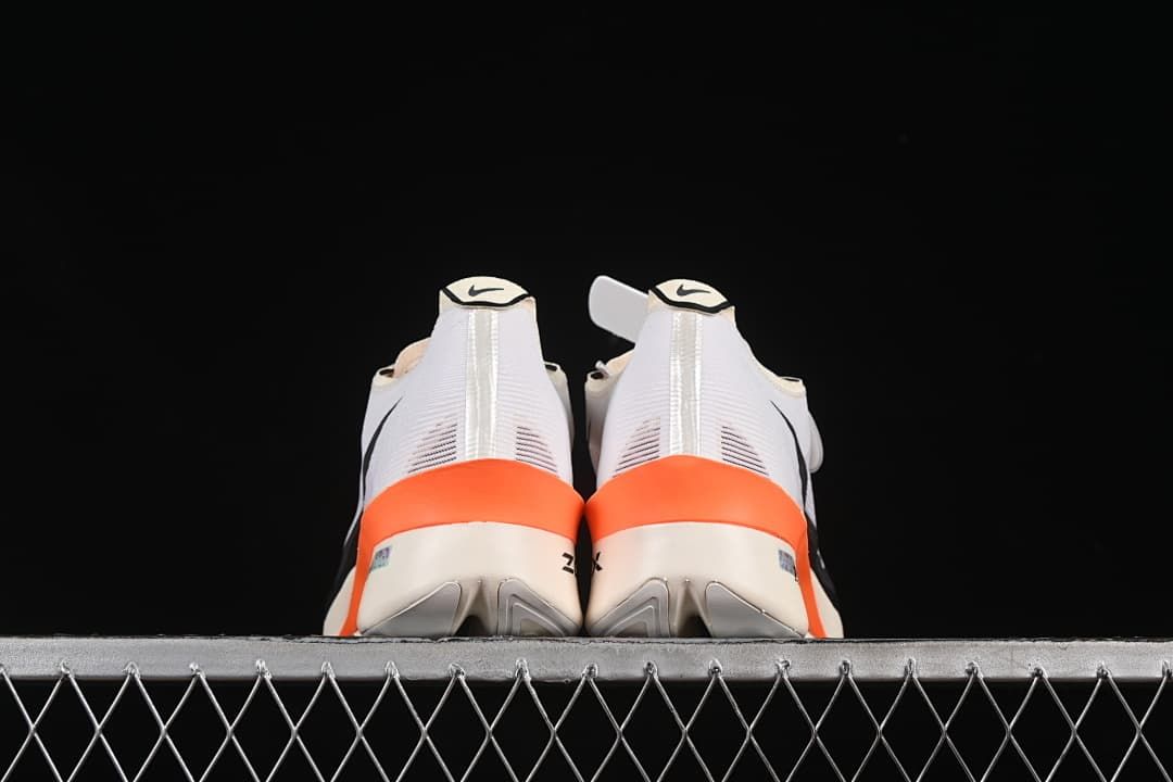 Rear view of the pair showing orange heel accents