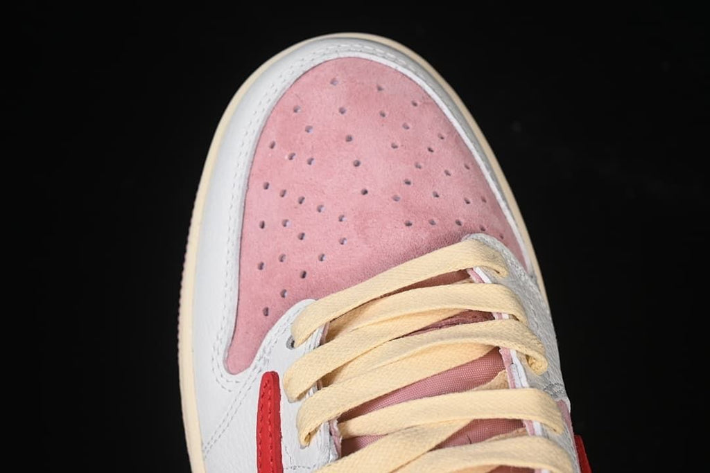Perforated pink toe panel with cream laces