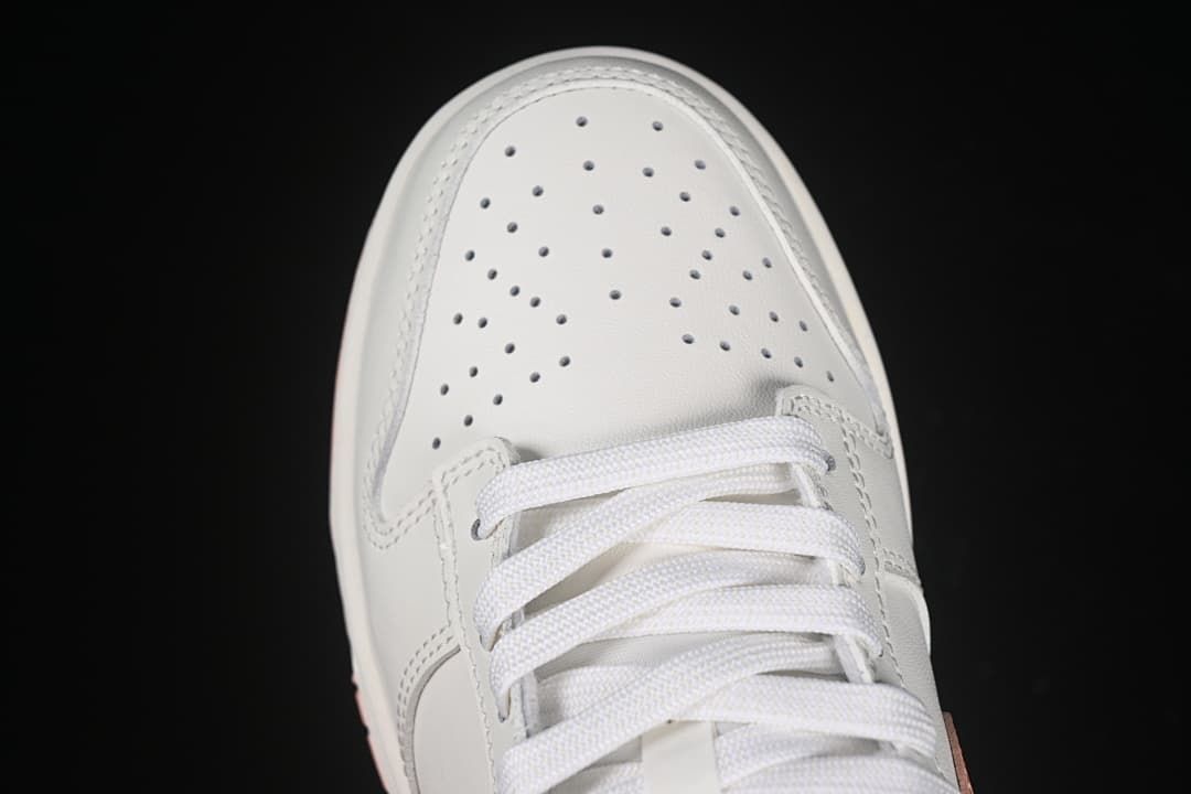 Top view of the perforated toe box and white laces