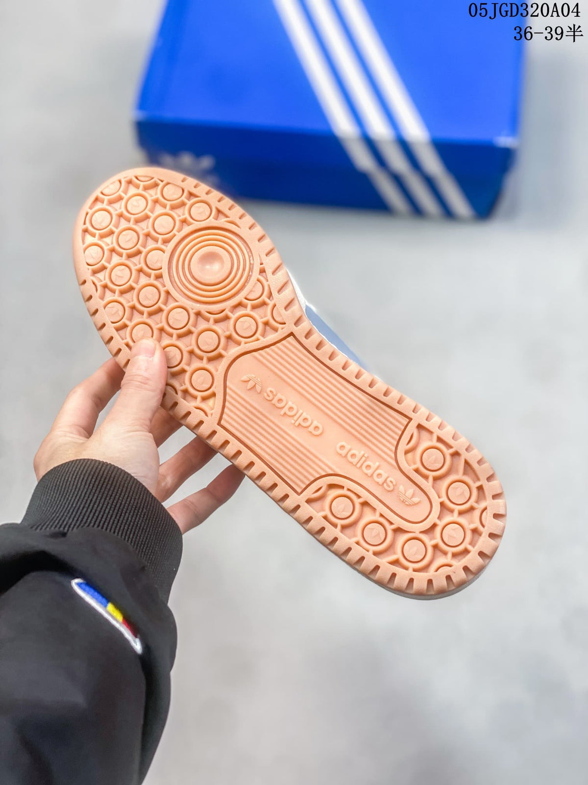 Gum-colored outsole with circular tread pattern