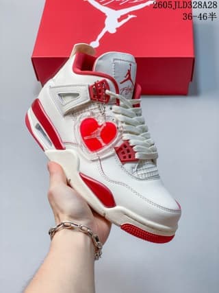 Side view showing the heart-shaped detail on a white and red Air Jordan 4