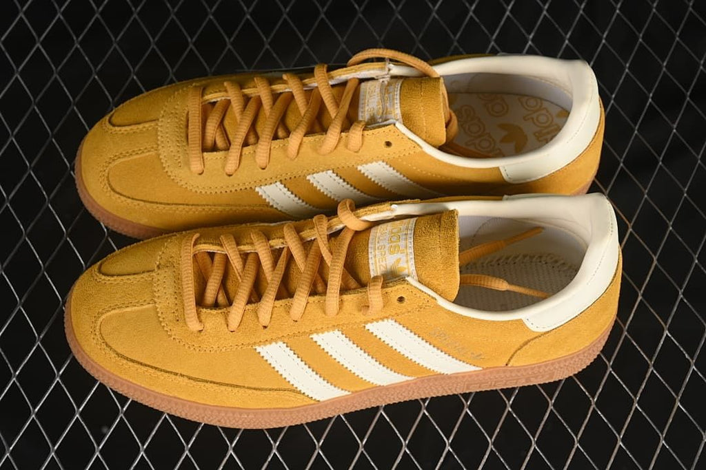 Pair of golden-yellow Handball Spezial sneakers viewed from above