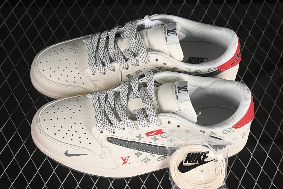 Top view of a pair of off-white patterned low-top sneakers with gray and red details and spare laces.