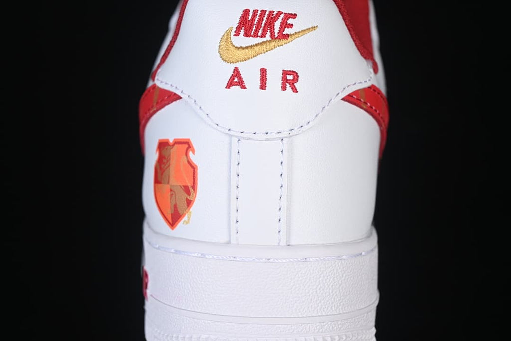 Rear view of the sneaker with embroidered Nike Air branding and a zodiac-inspired heel graphic.