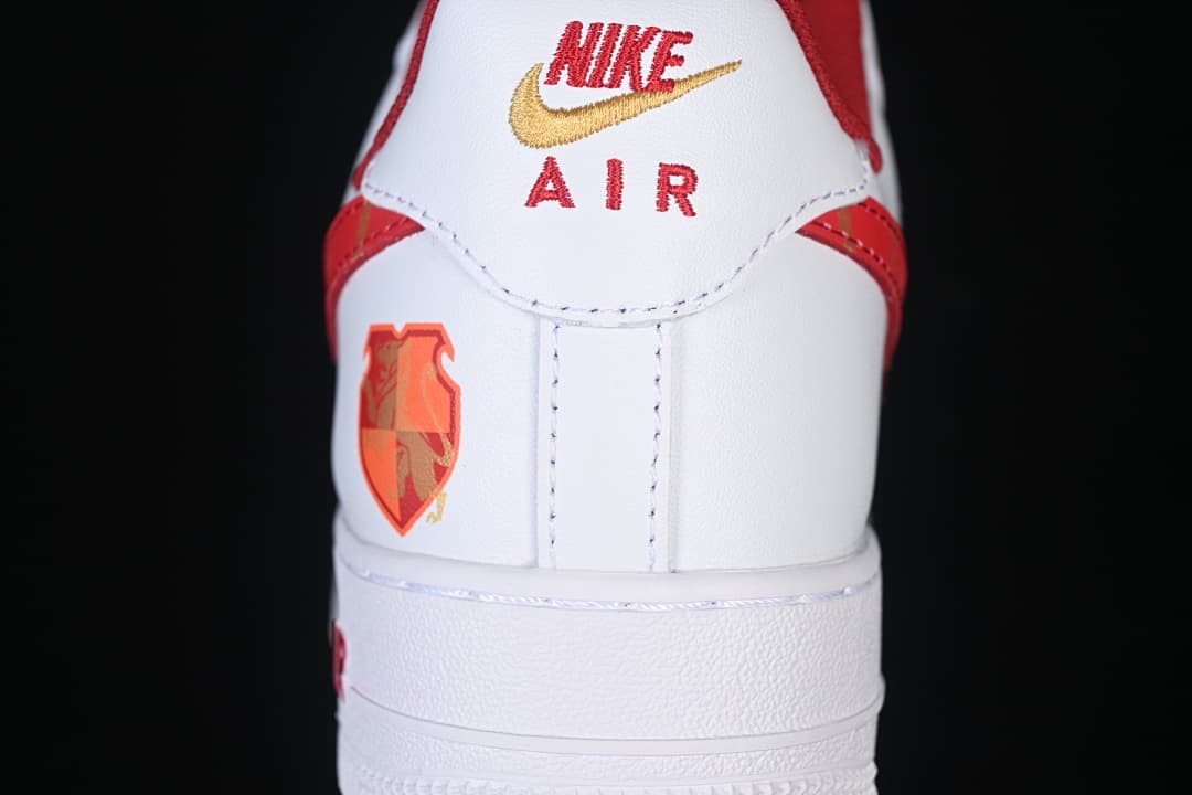 Rear view of the sneaker with embroidered Nike Air branding and a zodiac-inspired heel graphic.