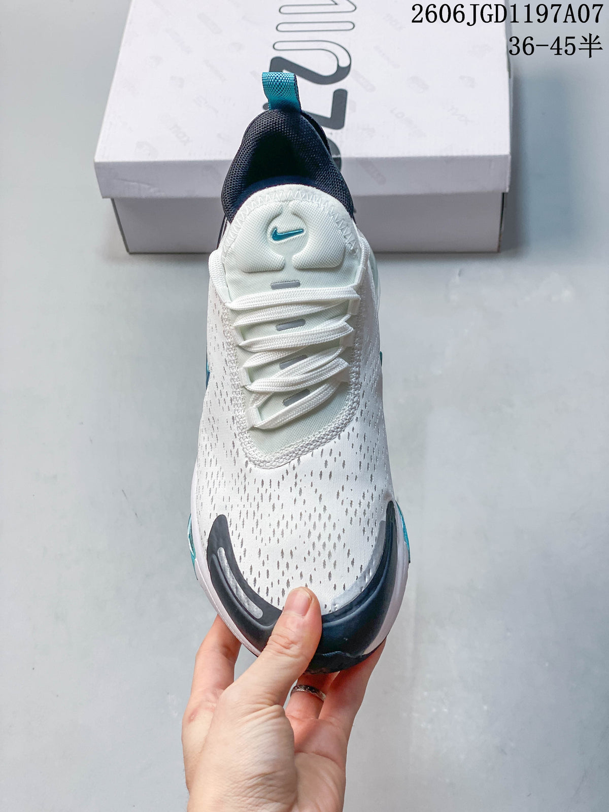 Top view showing the laces, perforated-looking upper, and teal details