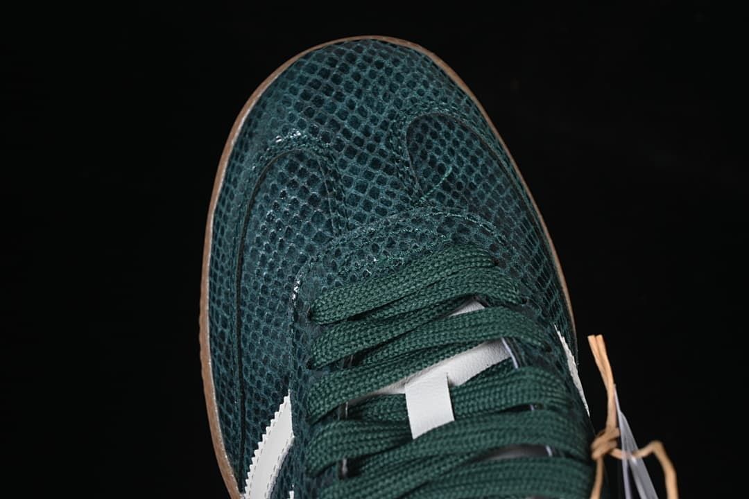 Top view of the green textured toe and lace area