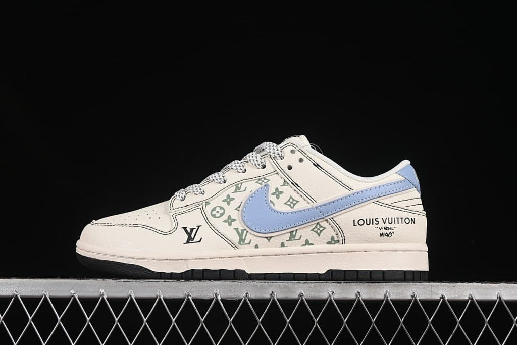 Side view of an off-white low-top sneaker with a light blue swoosh, green monogram-style graphics and contrast stitching