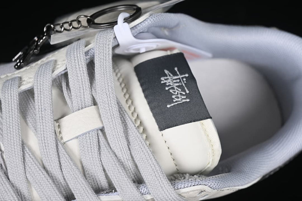 Close-up of the tongue label, laces, and attached tag