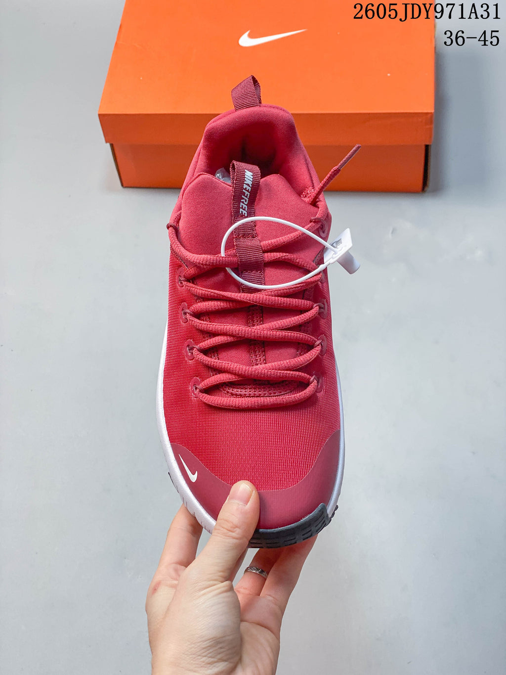 Top view of the red Nike Free Metcon 6 shoe showing its lace-up closure and rounded toe