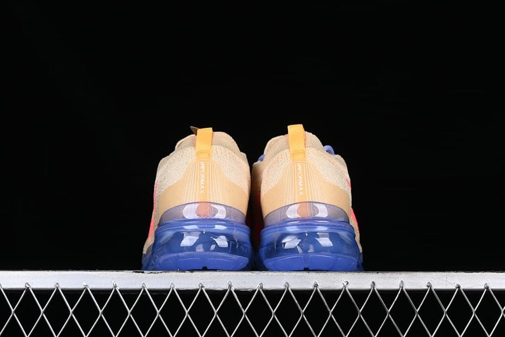 Rear view of the pair showing orange heel tabs and blue sole units.