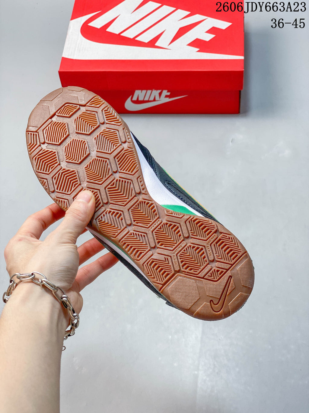 Close-up of the sneaker's gum-colored outsole with geometric tread