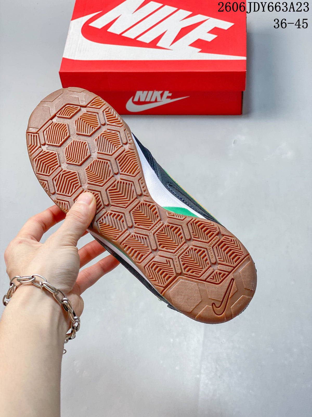 Close-up of the sneaker's gum-colored outsole with geometric tread