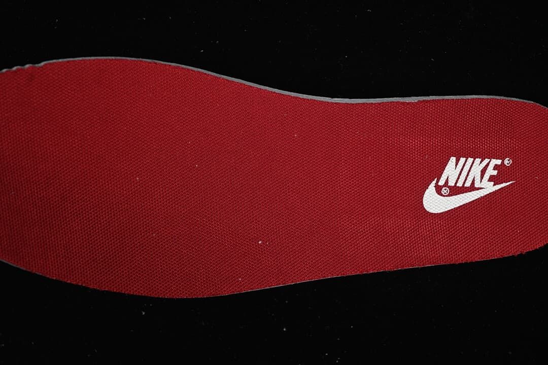Red insole with Nike branding