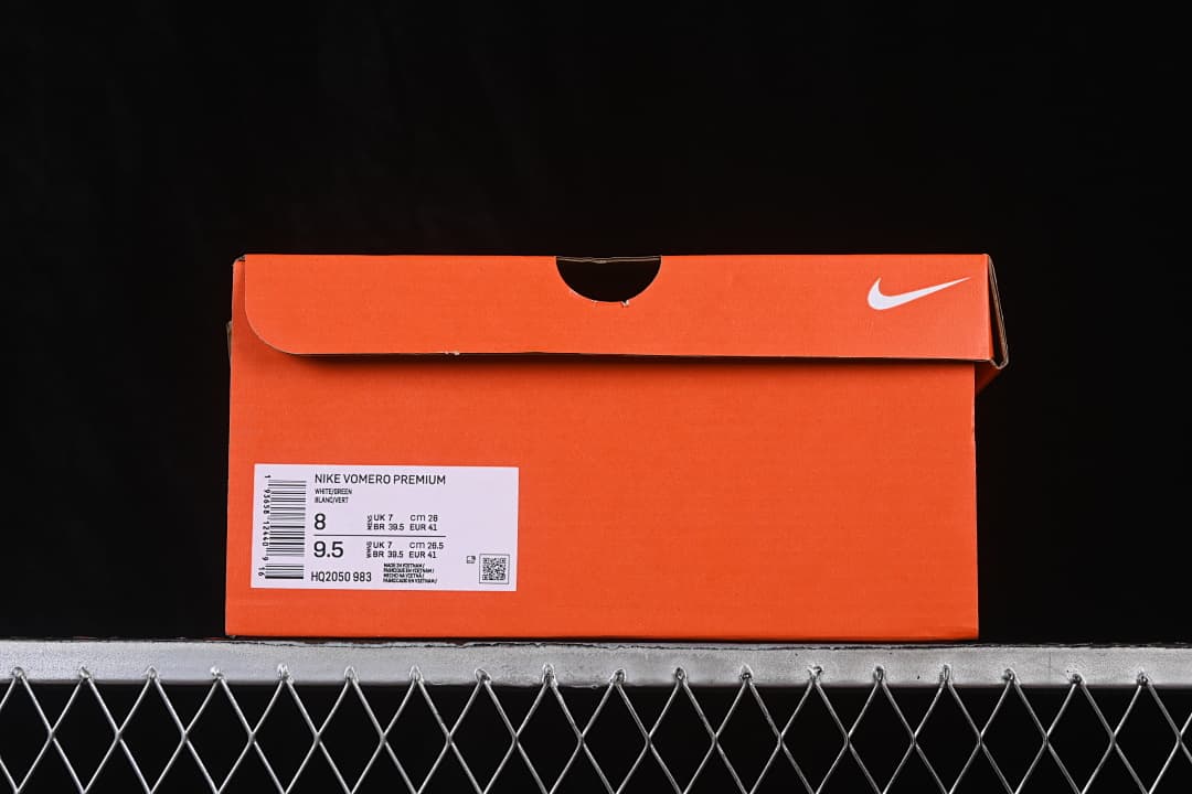 Orange Nike shoe box label showing Vomero Premium and size information
